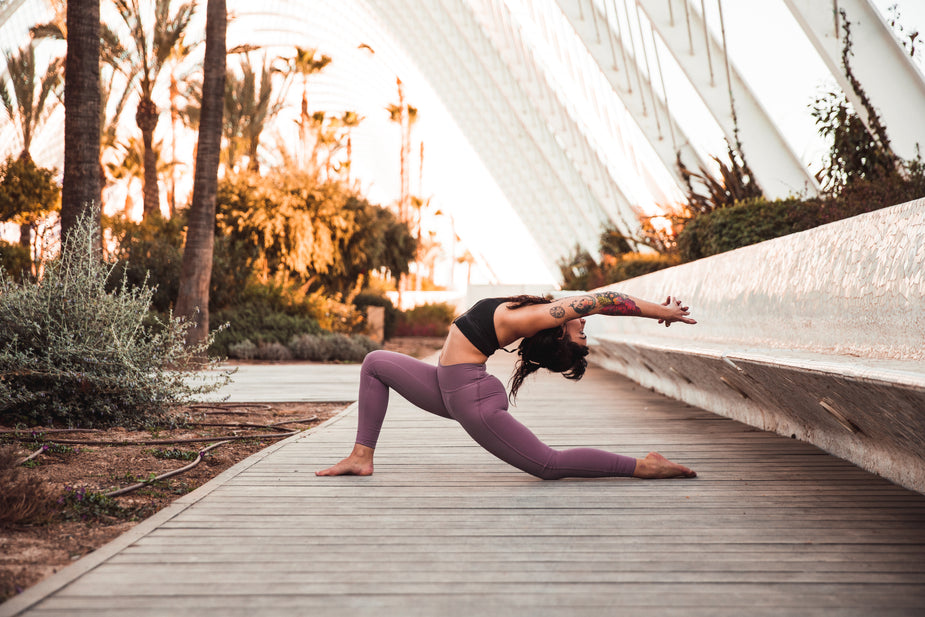 warrior one yoga pose in greenhouse scopist