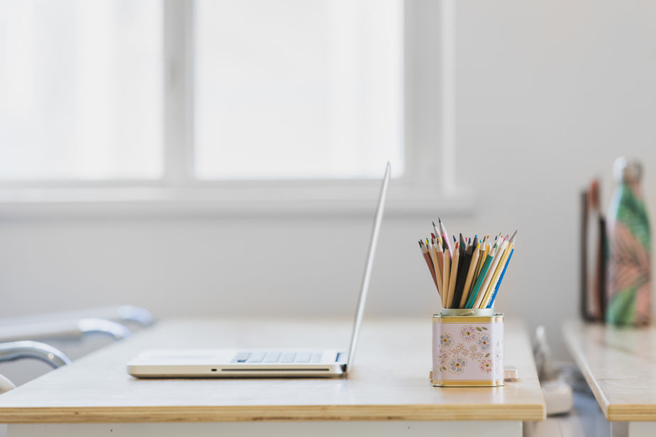 tidy desk in window lighting to manage time