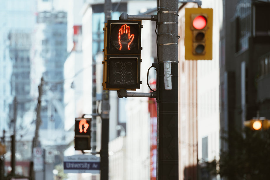 Two stop lights, one after the other for pedestrians. You must stop. Seriously. Don't walk. Metaphor for complacency and stuck in your ways when improving and building your skills as a scopist, proofreader, or transcriptionist